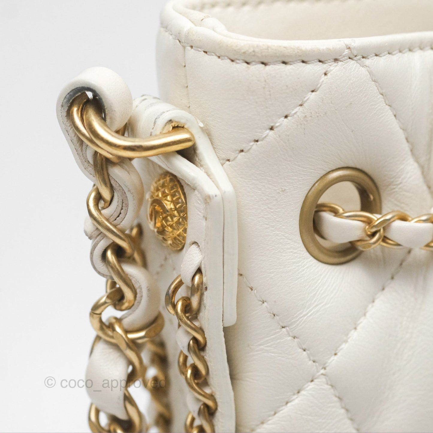 Chanel Quilted Drawstring Bucket Bag Ivory Lambskin Aged Gold Hardware
