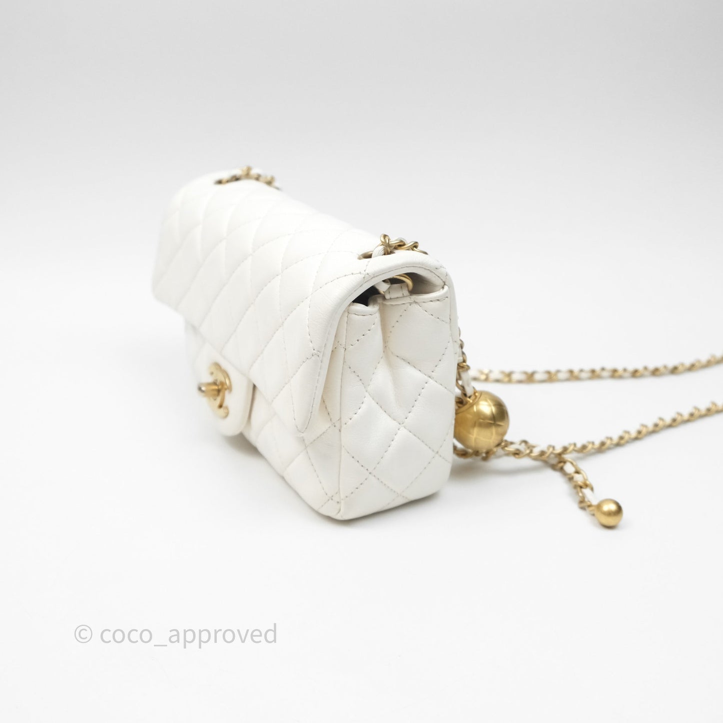 Chanel Mini Rectangular Pearl Crush Quilted White Lambskin Aged Gold Hardware