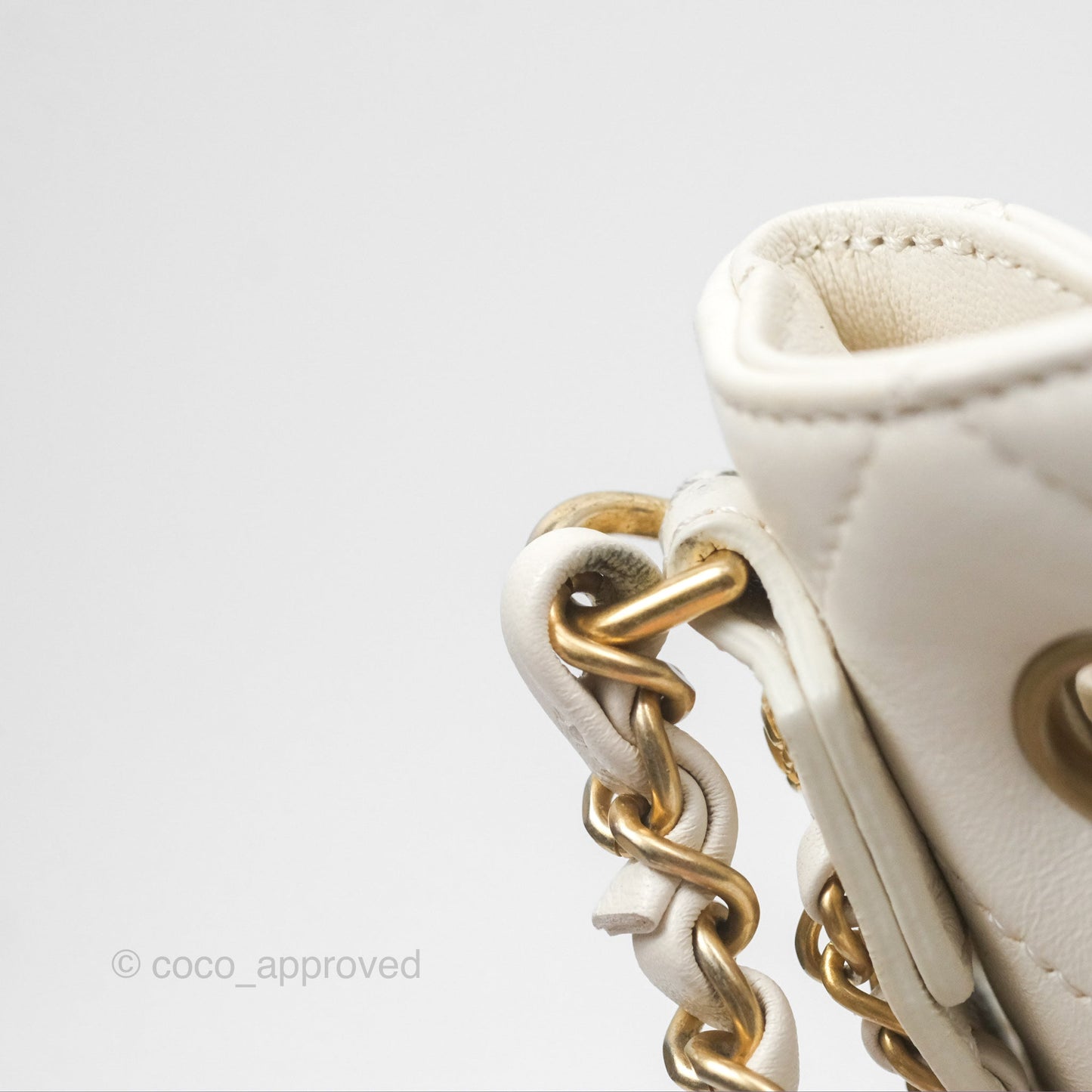 Chanel Quilted Drawstring Bucket Bag Ivory Lambskin Aged Gold Hardware