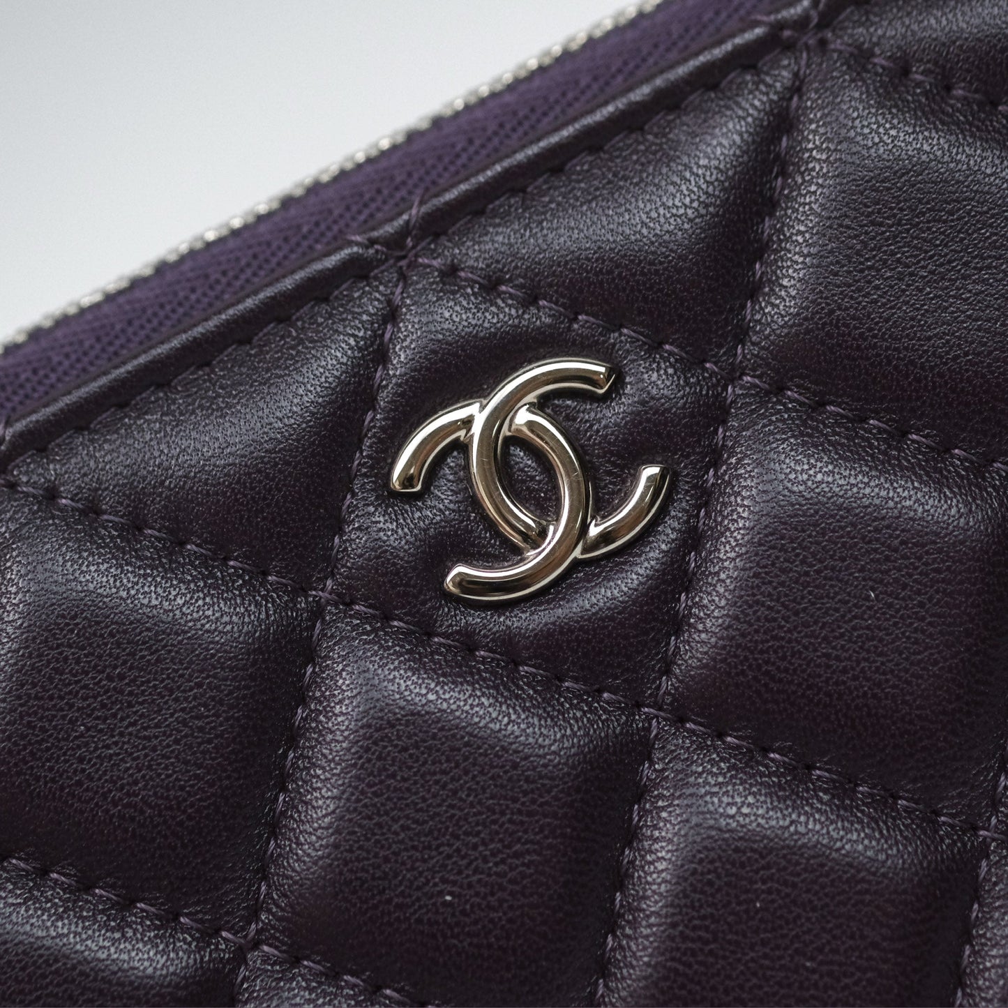 Chanel Quilted Small O Case Dark Purple Lambskin Silver Hardware