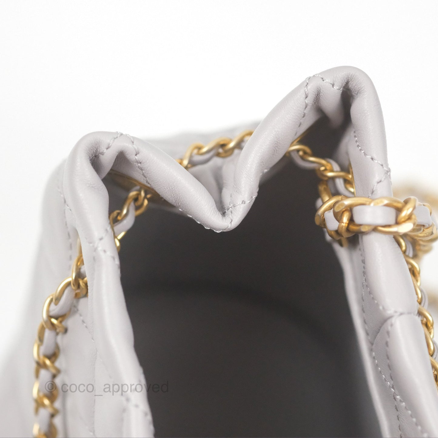 Chanel Pearl Crush Drawstring Bucket Bag Grey Lambskin Aged Gold Hardware