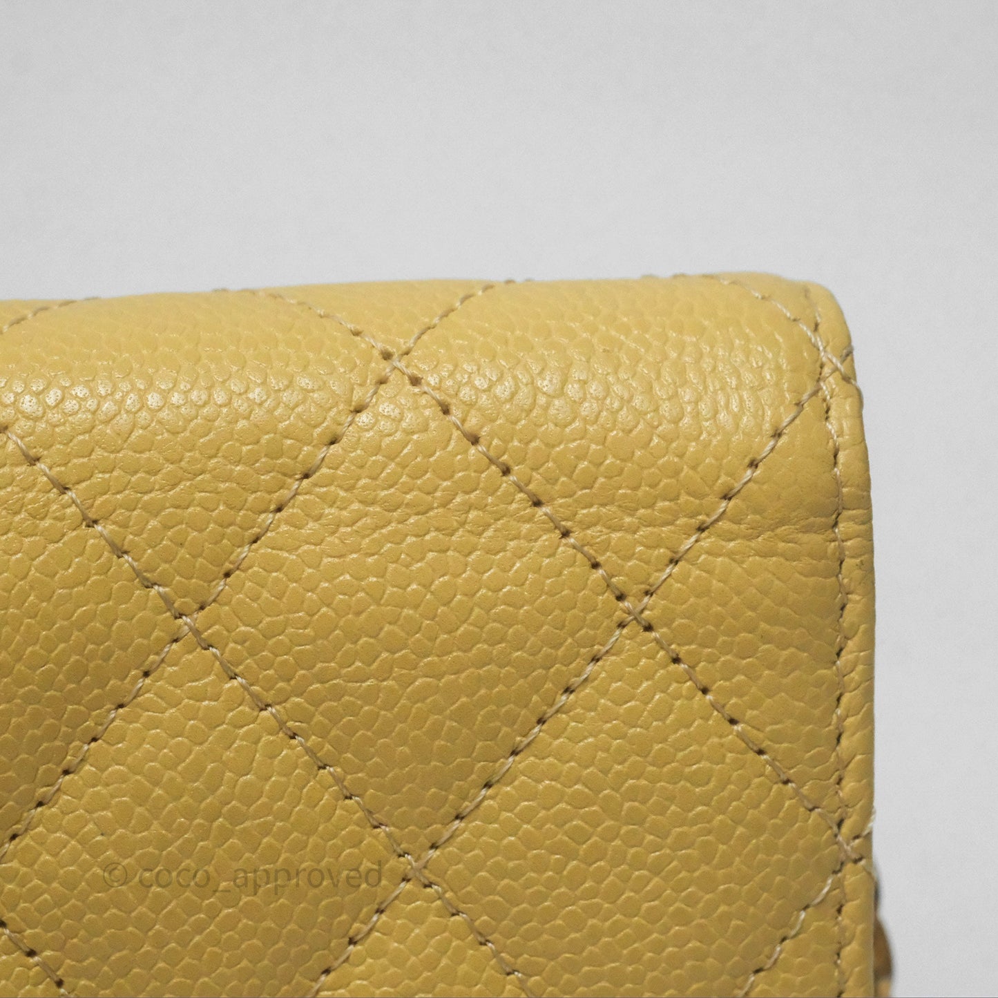 Chanel Mini Clutch With Chain Yellow Caviar Aged Gold Hardware