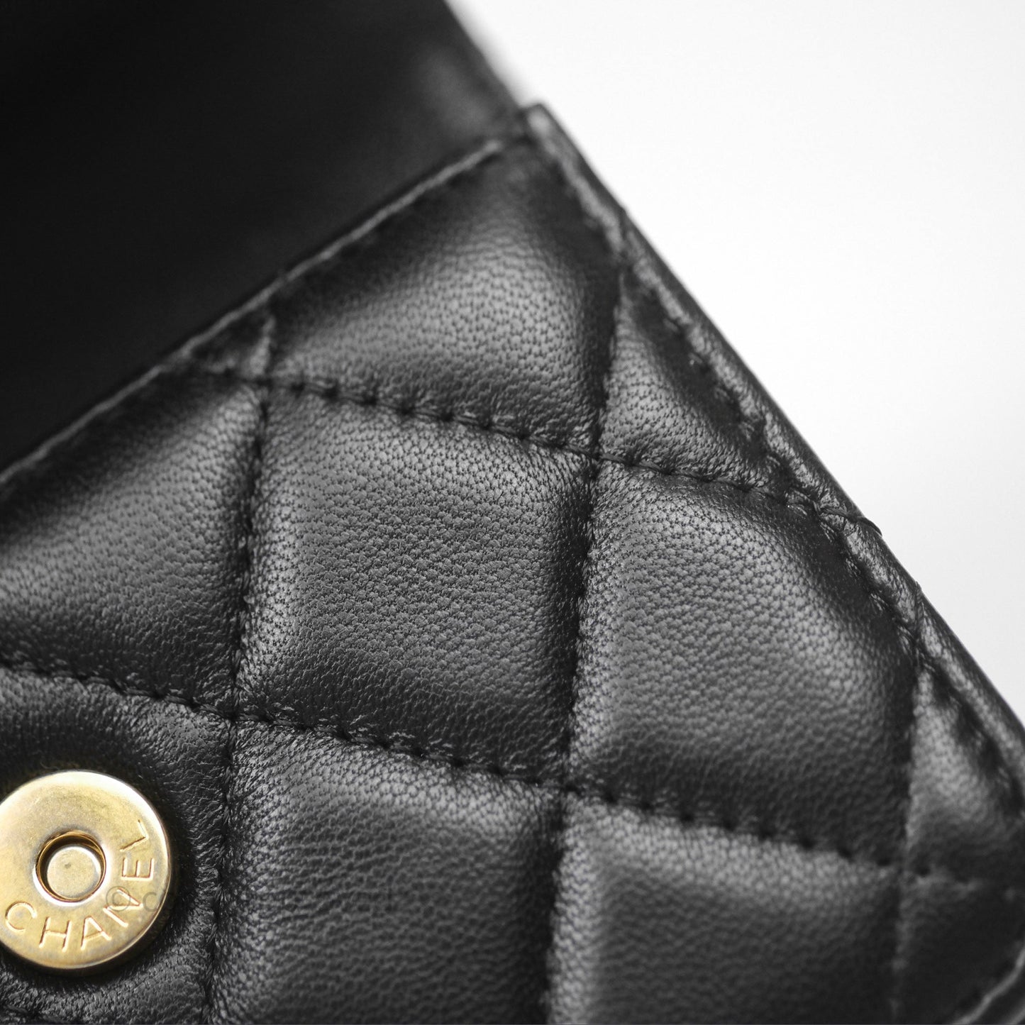 Chanel Mini Clutch With Chain Camellia Adjustable Black Lambskin Aged Gold Hardware