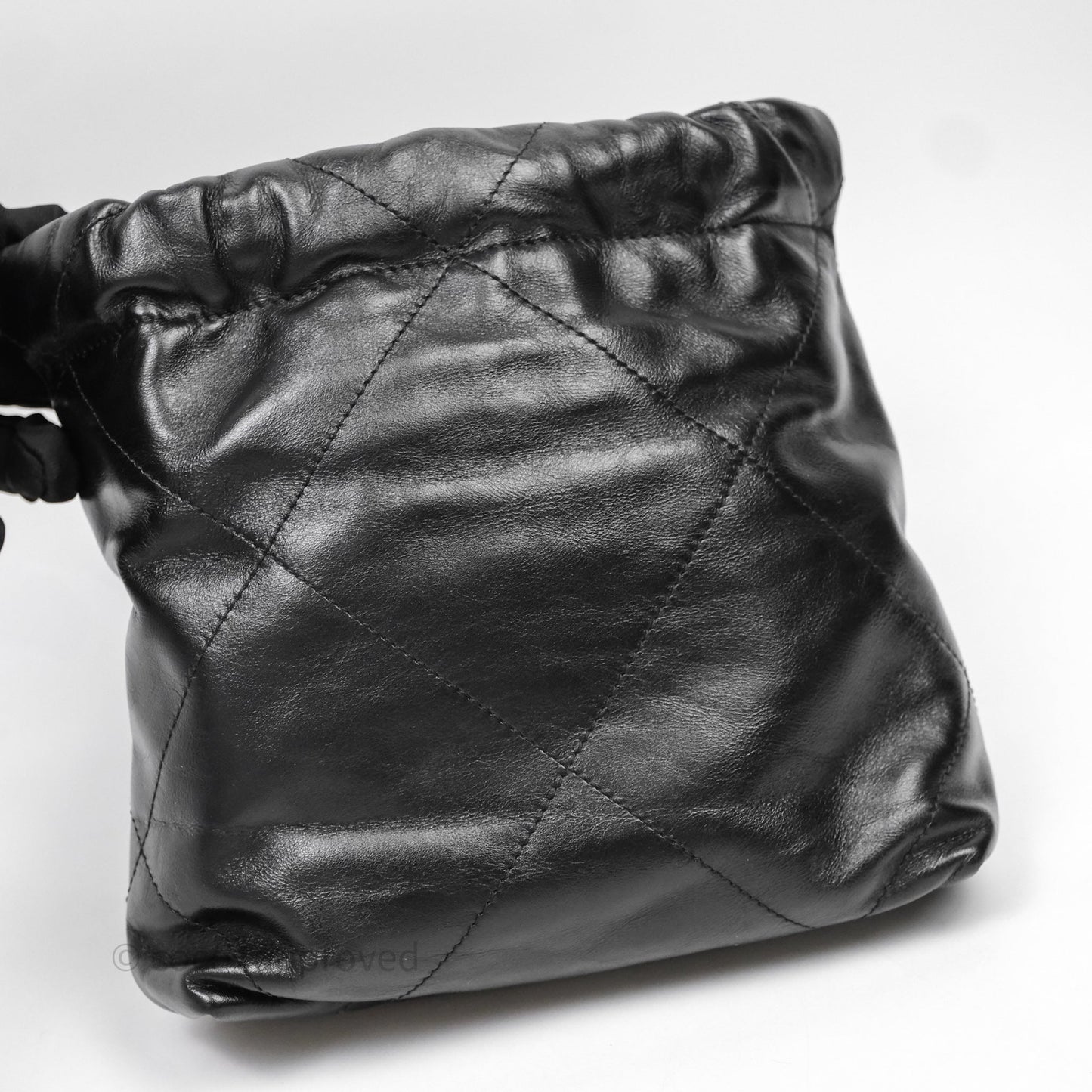 Chanel 22 Mini Bag Black Crumpled Calfskin White Lacquered Metal Logo
