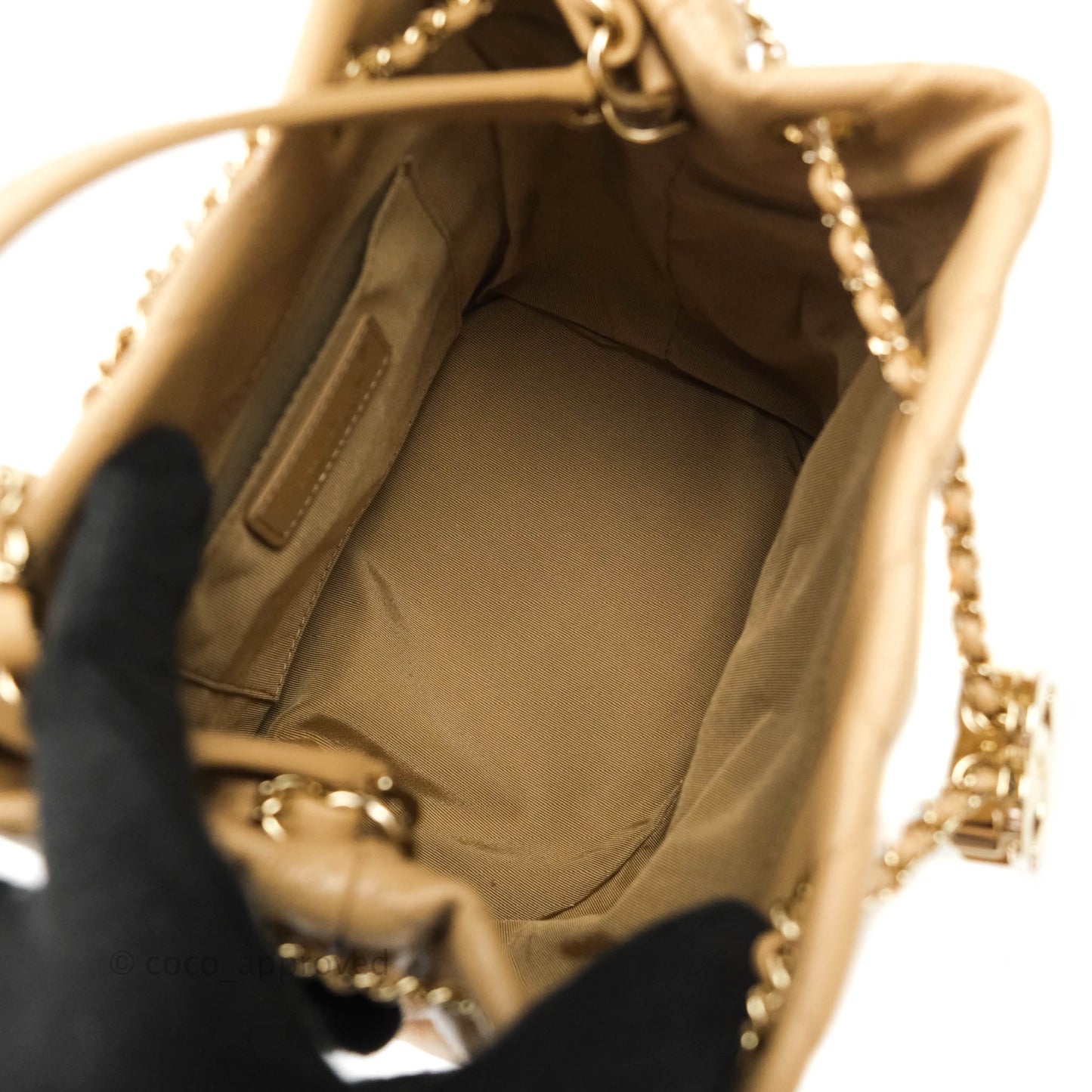 Chanel Caviar Quilted Rolled Up Bucket Drawstring Bag Beige Gold Hardware