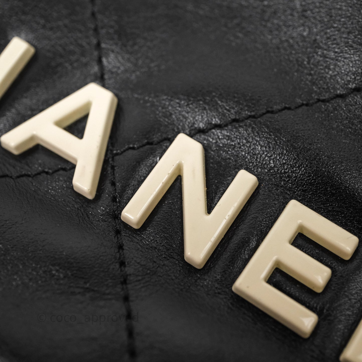 Chanel 22 Mini Bag Black Crumpled Calfskin White Lacquered Metal Logo