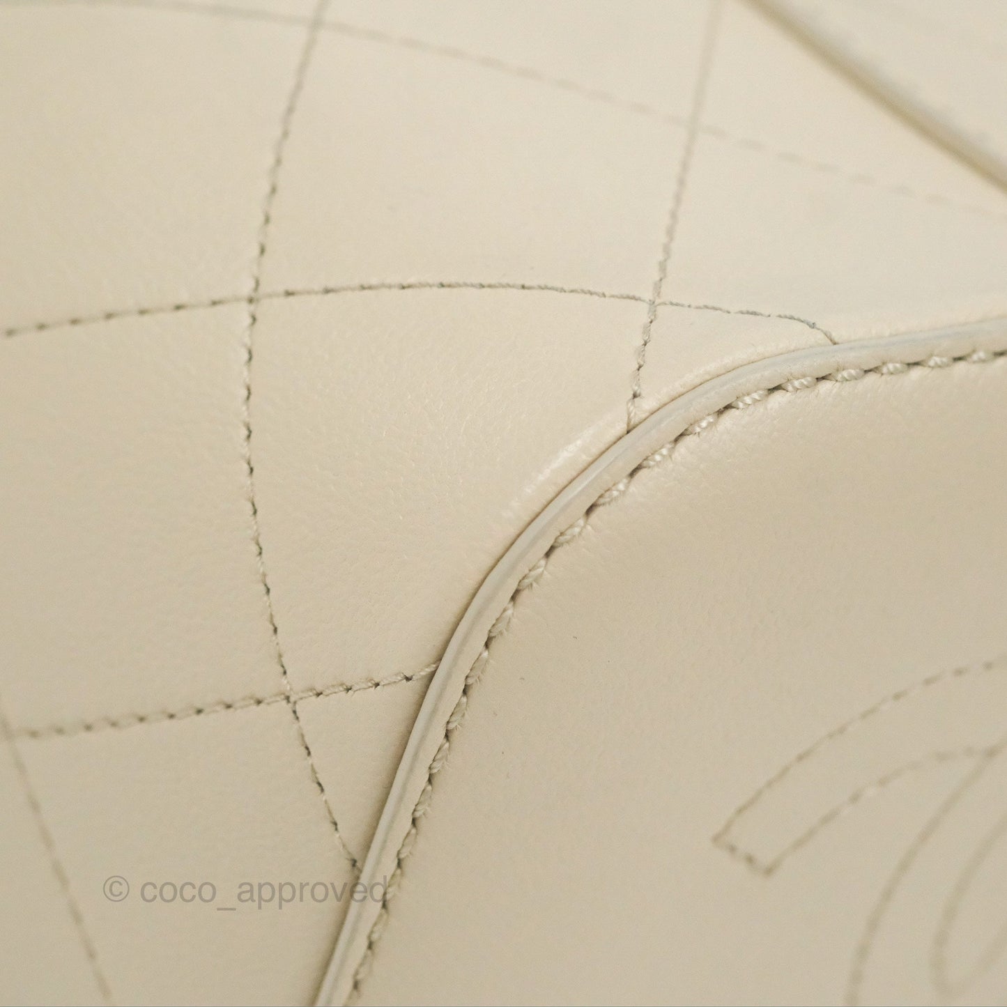 Chanel Quilted Drawstring Bucket Bag Ivory Lambskin Aged Gold Hardware 19C