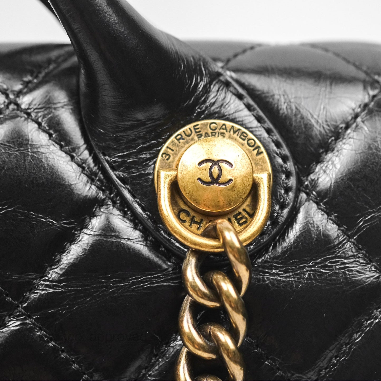 Chanel Medium Castle Rock Flap Black Glazed Calfskin Antique Gold Hardware