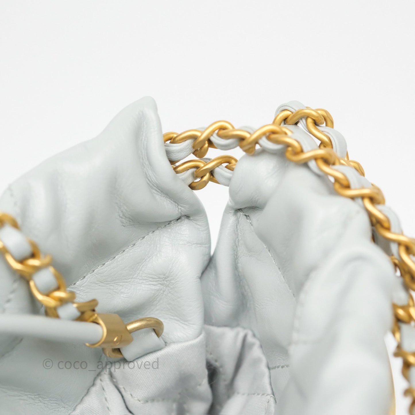 Chanel 22 Mini Bag Light Blue Shiny Crumpled Calfskin Aged Gold Hardware