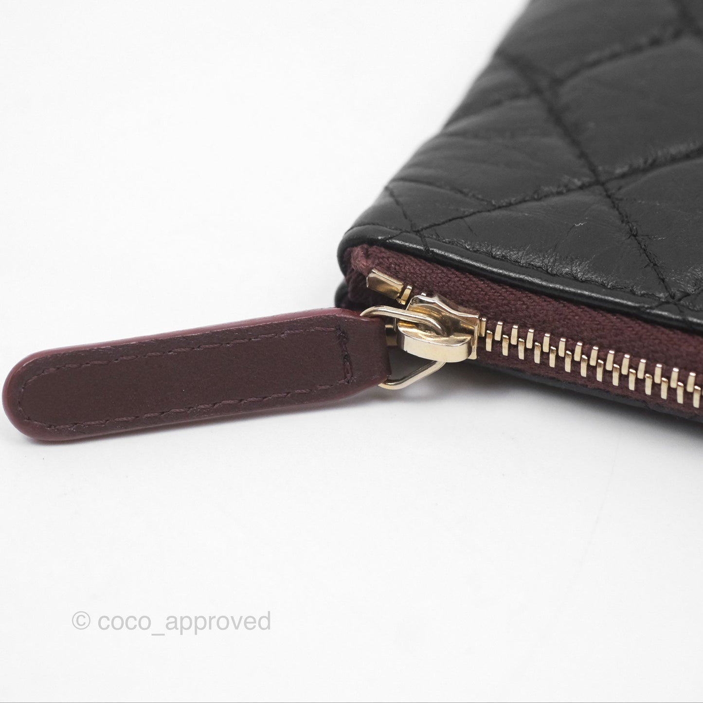 Chanel Quilted Mini Reissue O Case Black Calfskin Aged Gold Hardware
