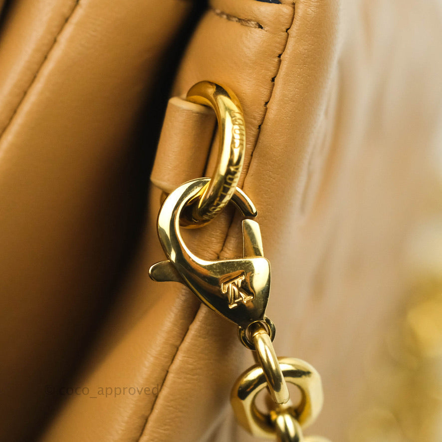 Louis Vuitton Pochette Coussin Monogram Caramel Beige Gold Hardware