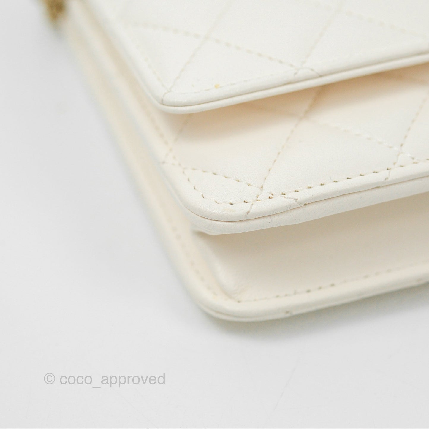 Chanel Quilted WOC White Lambskin Gold Hardware With Charms