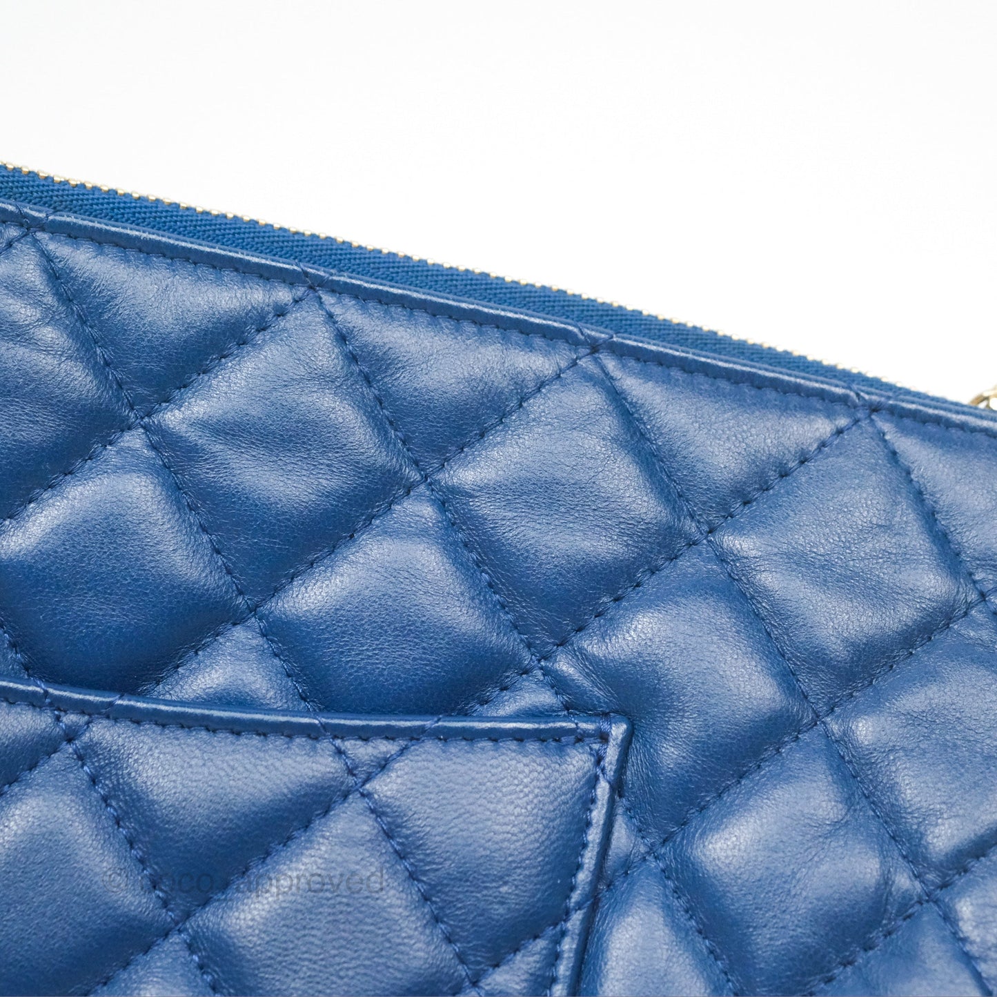Chanel Medium Quilted O Case Blue Lambskin Gold Hardware