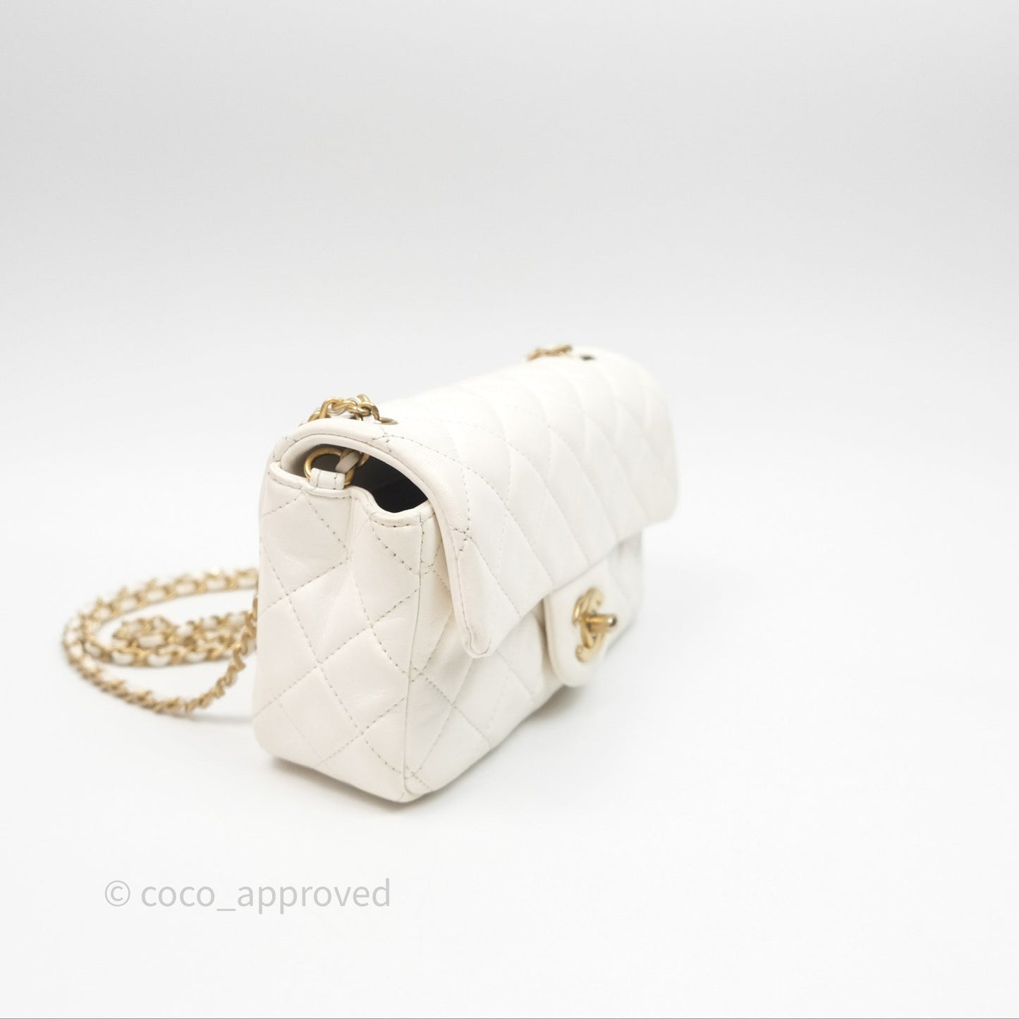 Chanel Mini Rectangular Pearl Crush Quilted White Lambskin Aged Gold Hardware