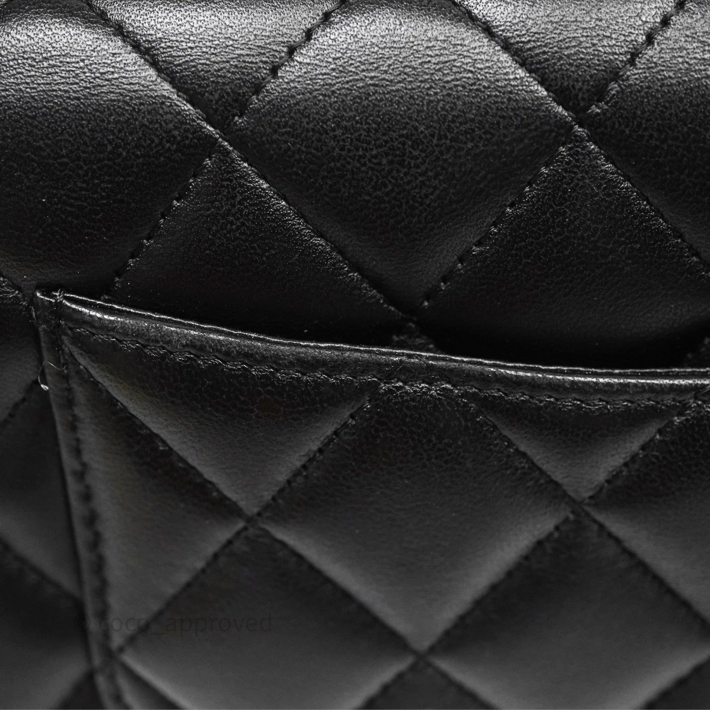 Chanel Quilted WOC Black Lambskin Silver Hardware