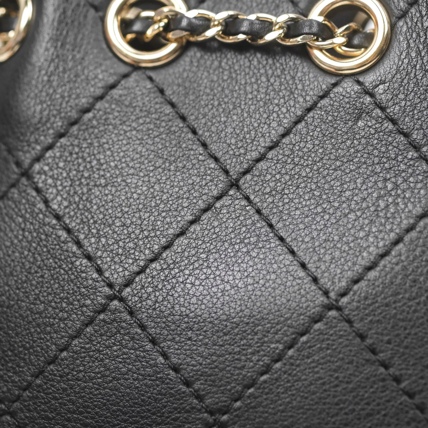 Chanel Quilted Drawstring Bucket Bag Black Calfskin Gold Hardware