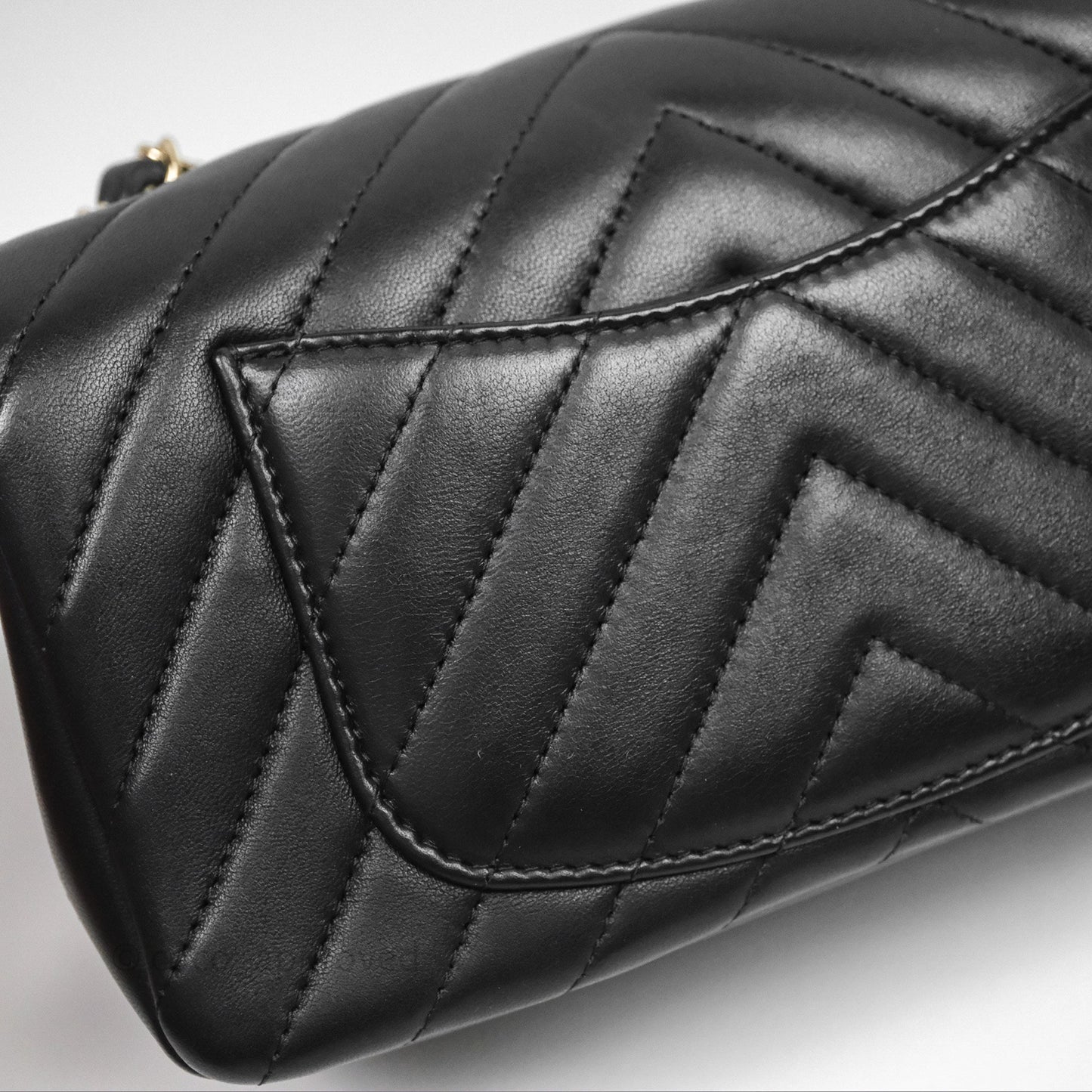 Chanel Quilted Mini Rectangular Chevron Black Lambskin Gold Hardware