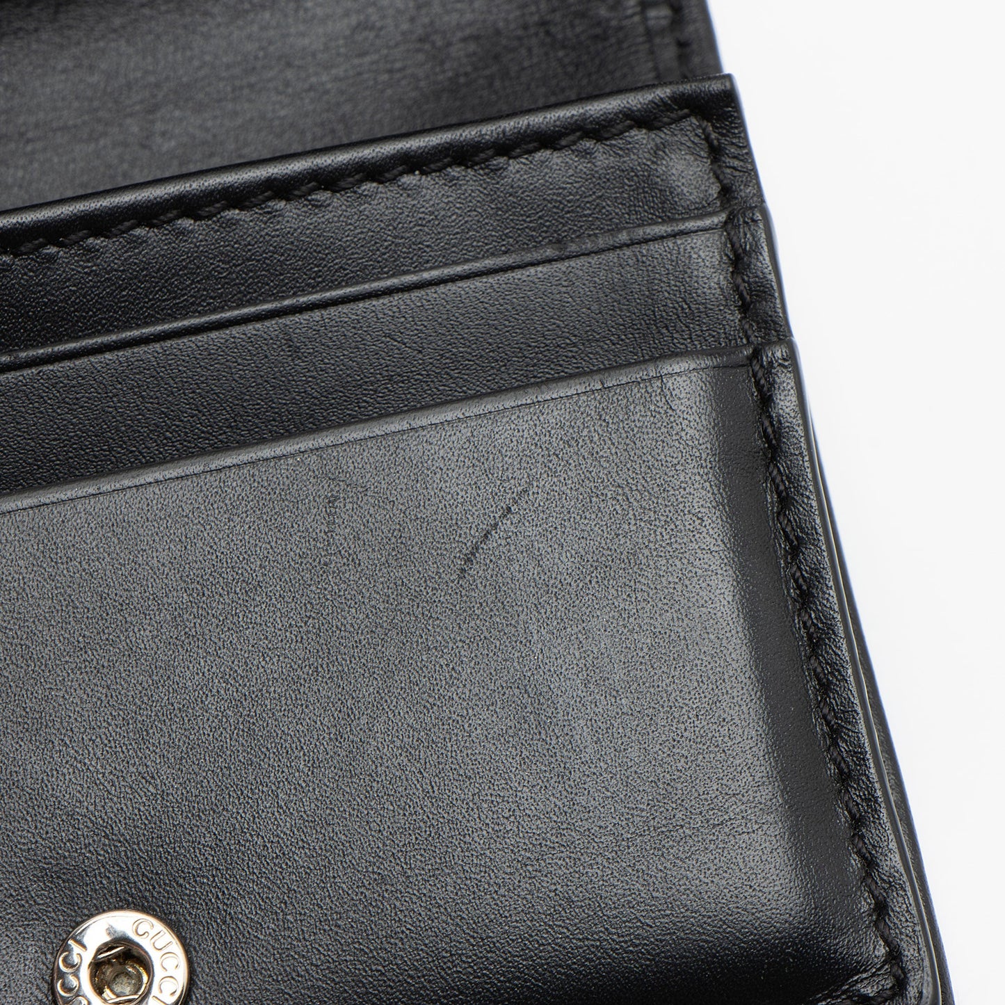 Gucci Guccissima Leather Bifold Wallet