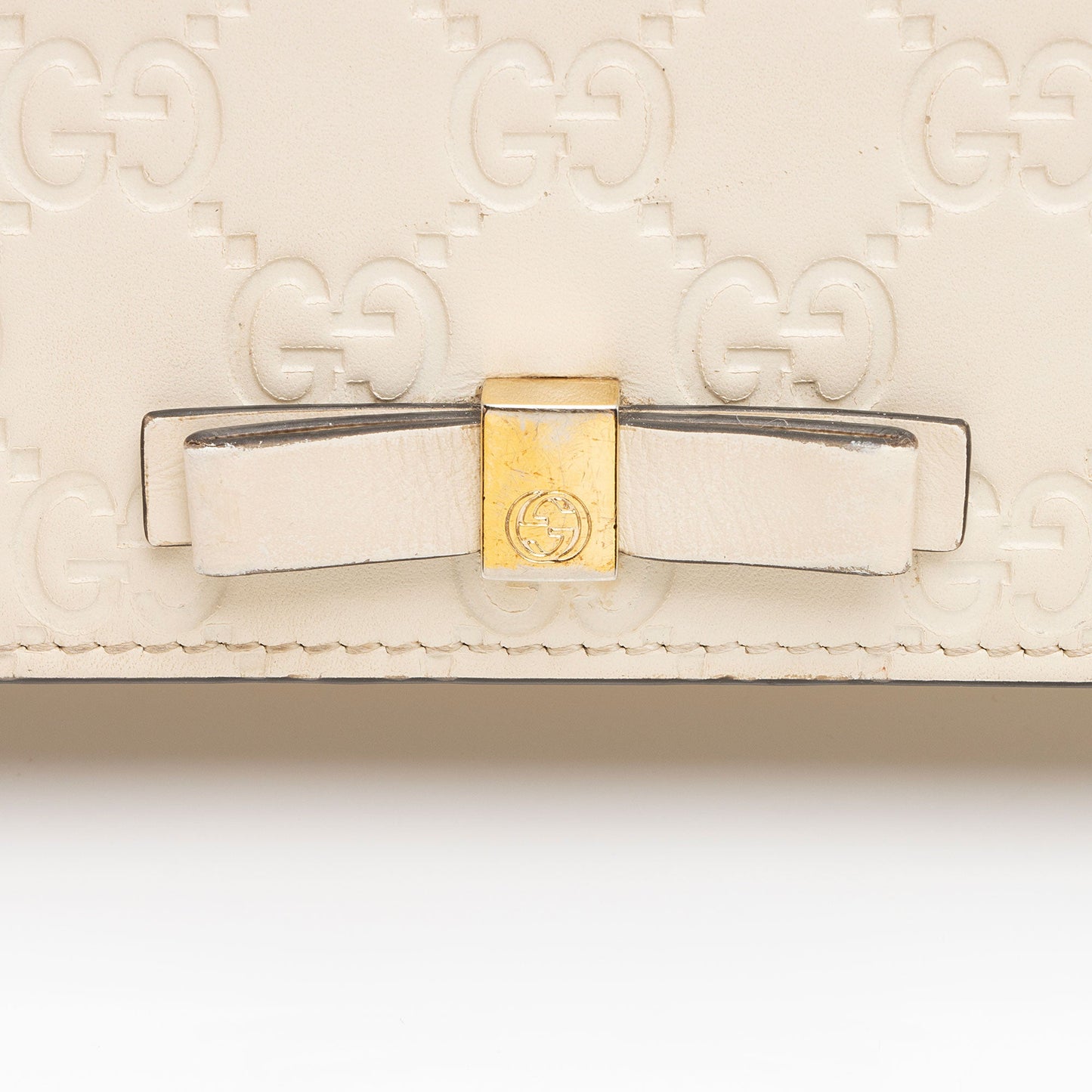 Gucci Guccissima Leather Signature Bow Mini Wallet on Chain