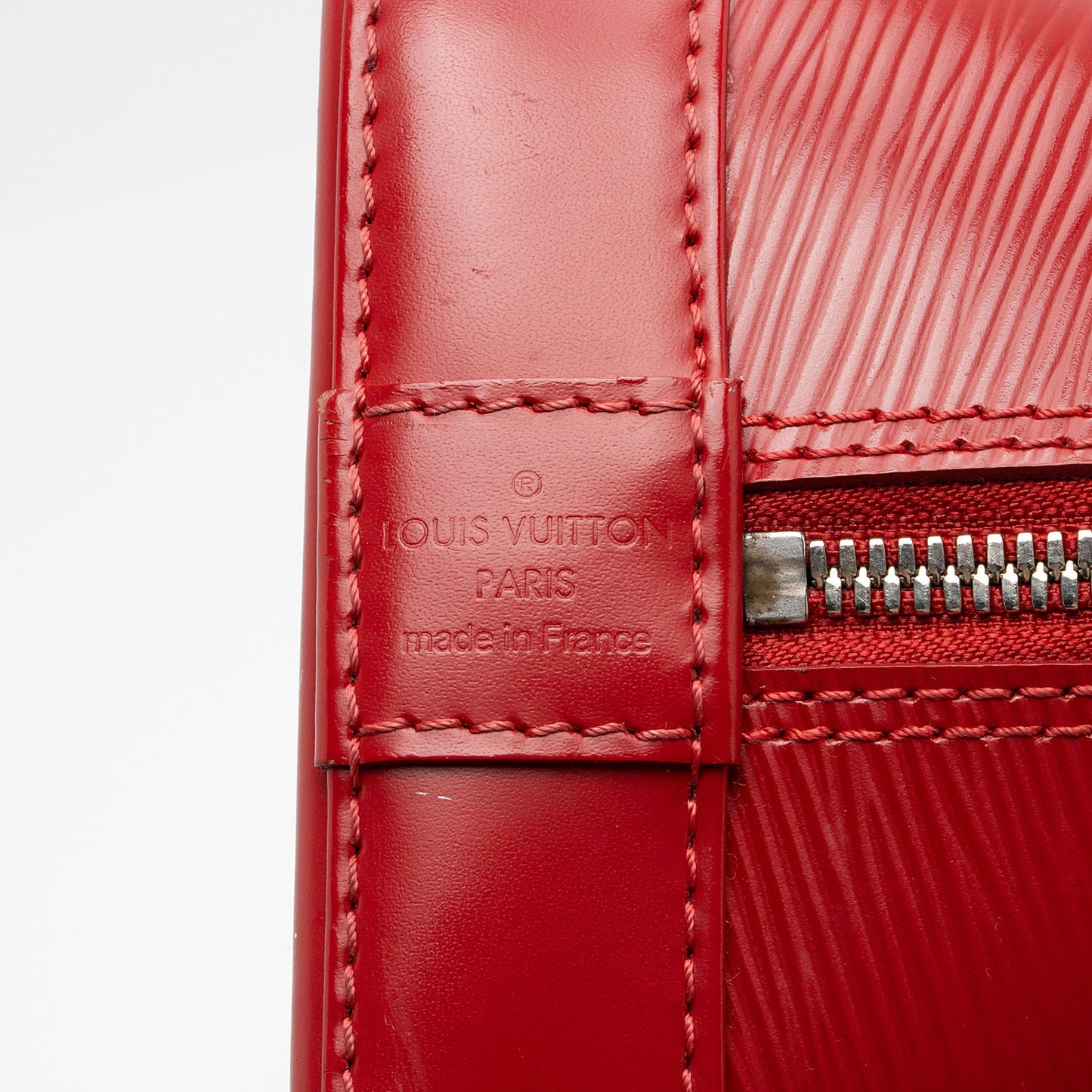 Louis Vuitton Epi Leather Alma PM Satchel (SHF-WDQc4X)