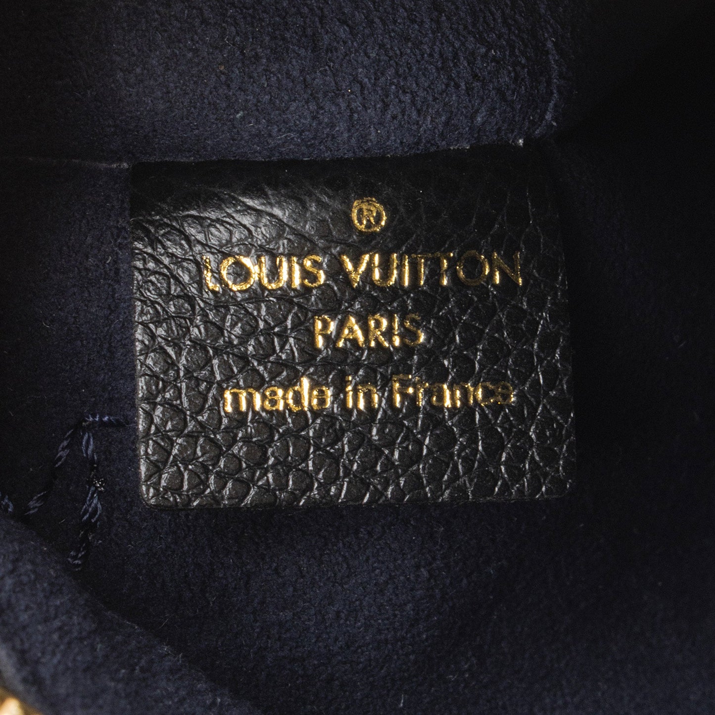 Louis Vuitton Giant Monogram Empreinte Neverfull MM Pochette (SHF-nVmtJ1)