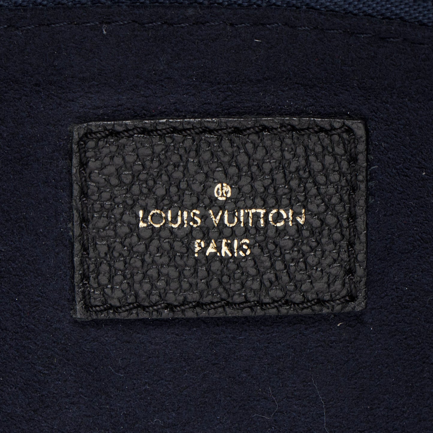 Louis Vuitton Giant Monogram Empreinte Neverfull MM Tote