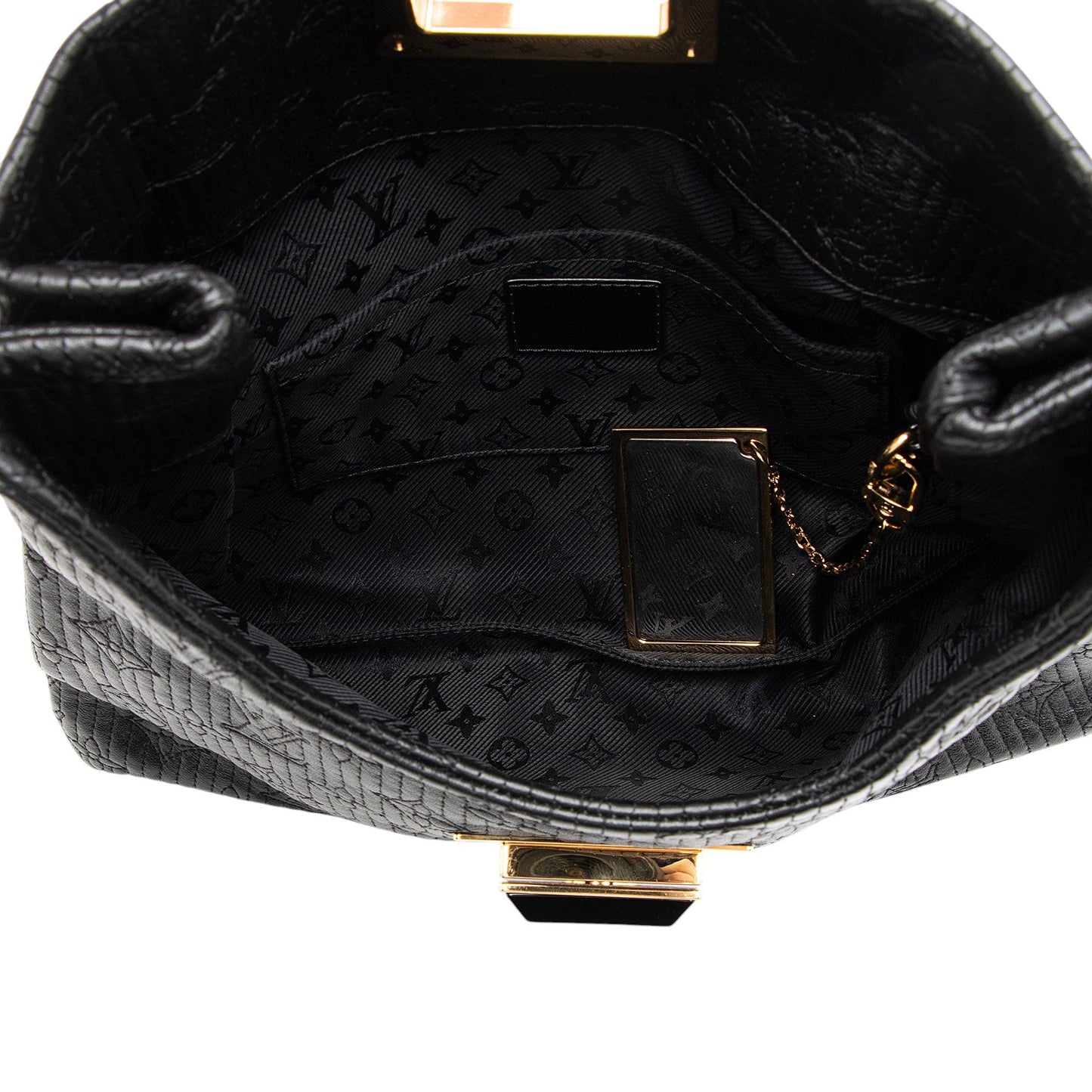 Louis Vuitton Leather Monogram Altair Clutch