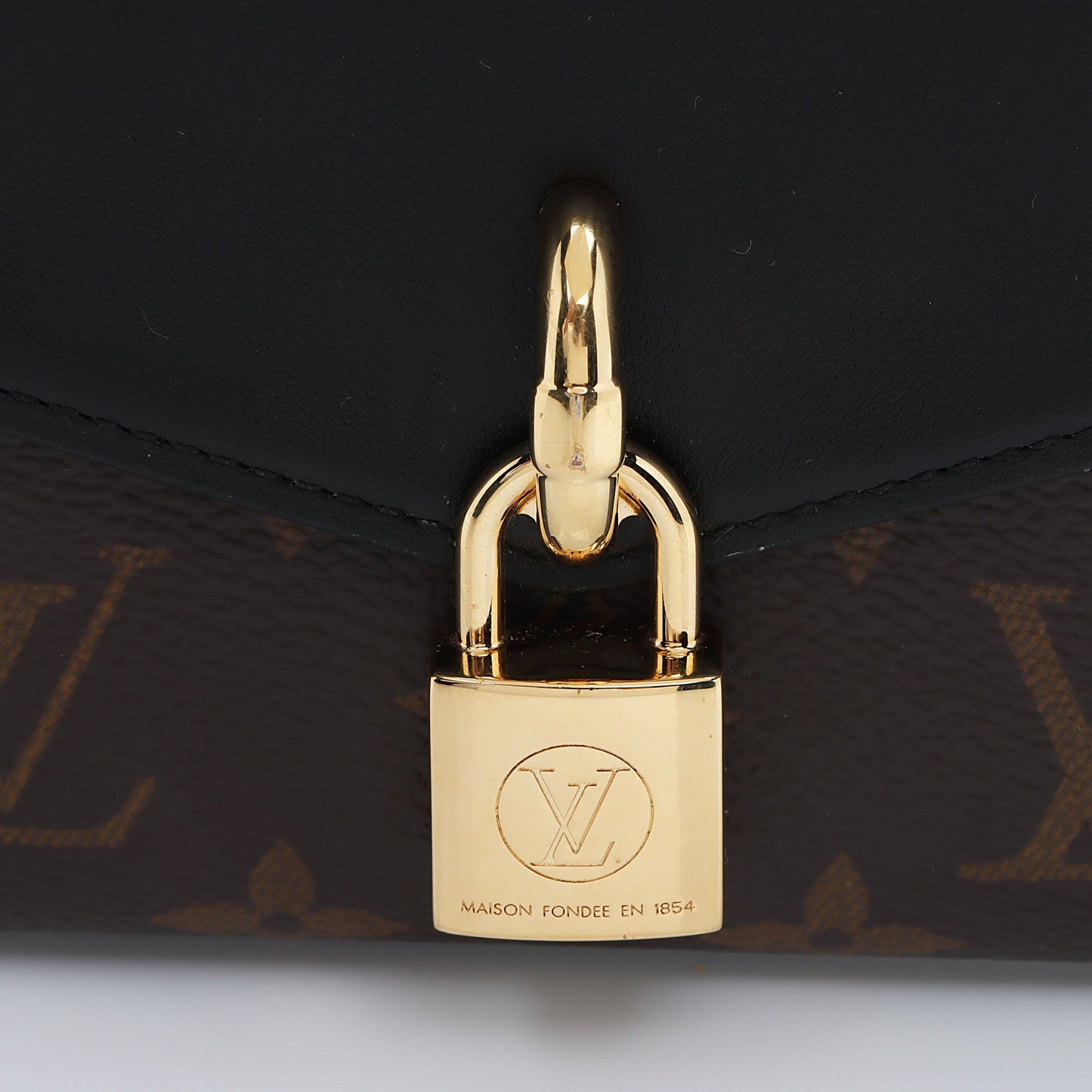 Louis Vuitton Monogram Canvas Padlock on Strap (SHF-Ss2gOb)