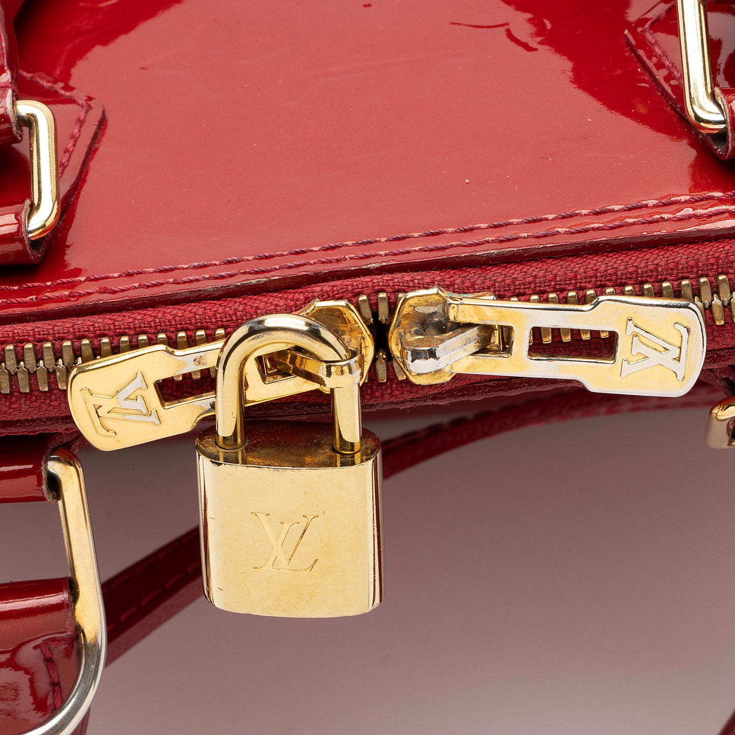 Louis Vuitton Monogram Vernis Alma BB Satchel (SHF-vZDusC)