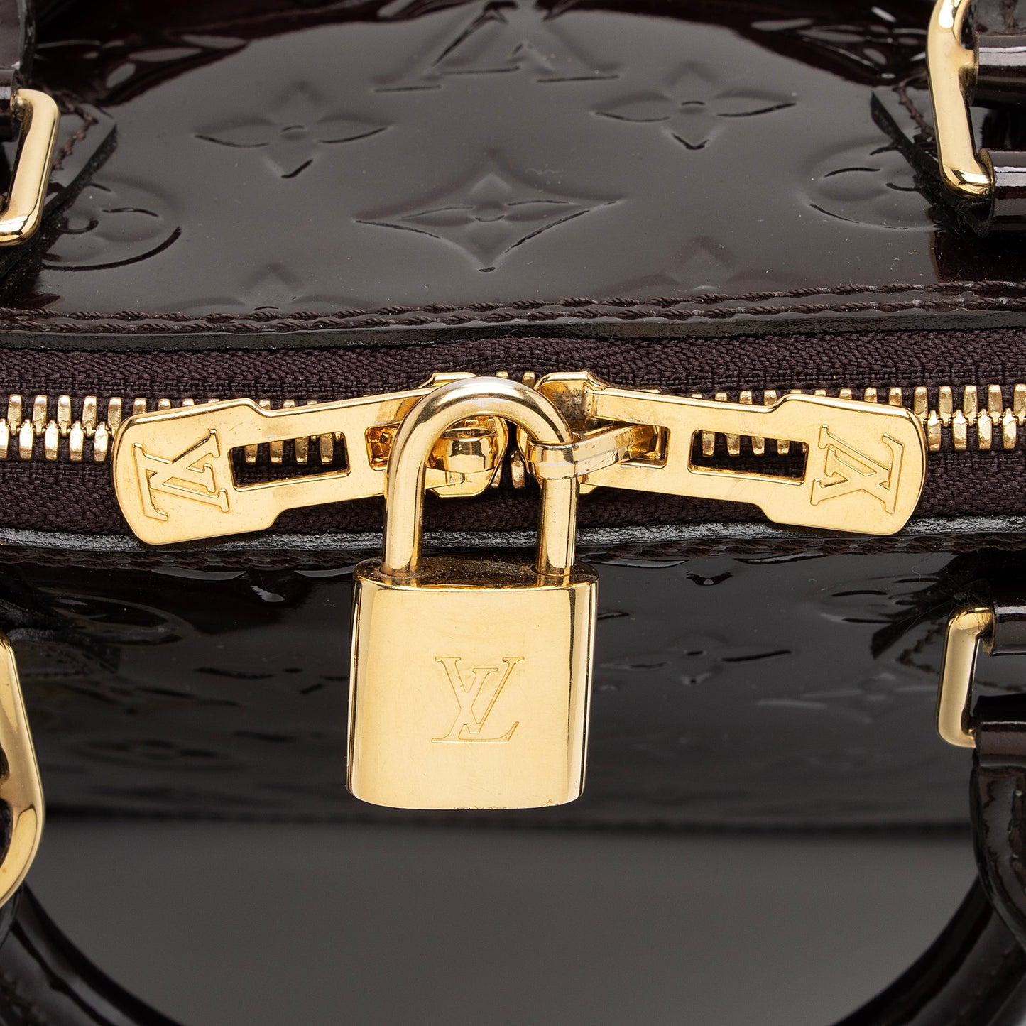 Louis Vuitton Monogram Vernis Alma PM Satchel (SHF-fmHWuP)