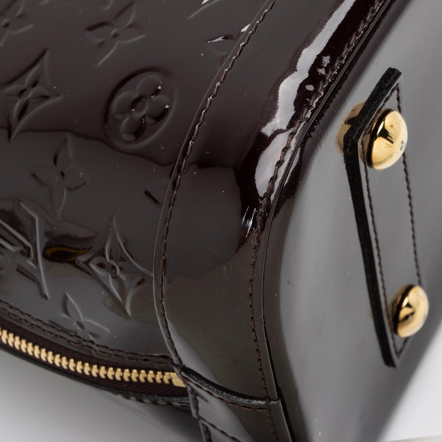Louis Vuitton Monogram Vernis Alma PM Satchel (SHF-fmHWuP)