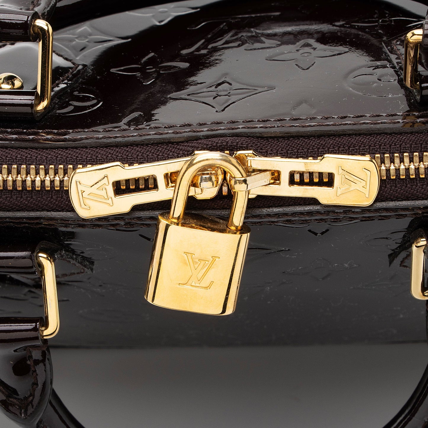 Louis Vuitton Monogram Vernis Alma PM Satchel (SHF-kN8GF6)