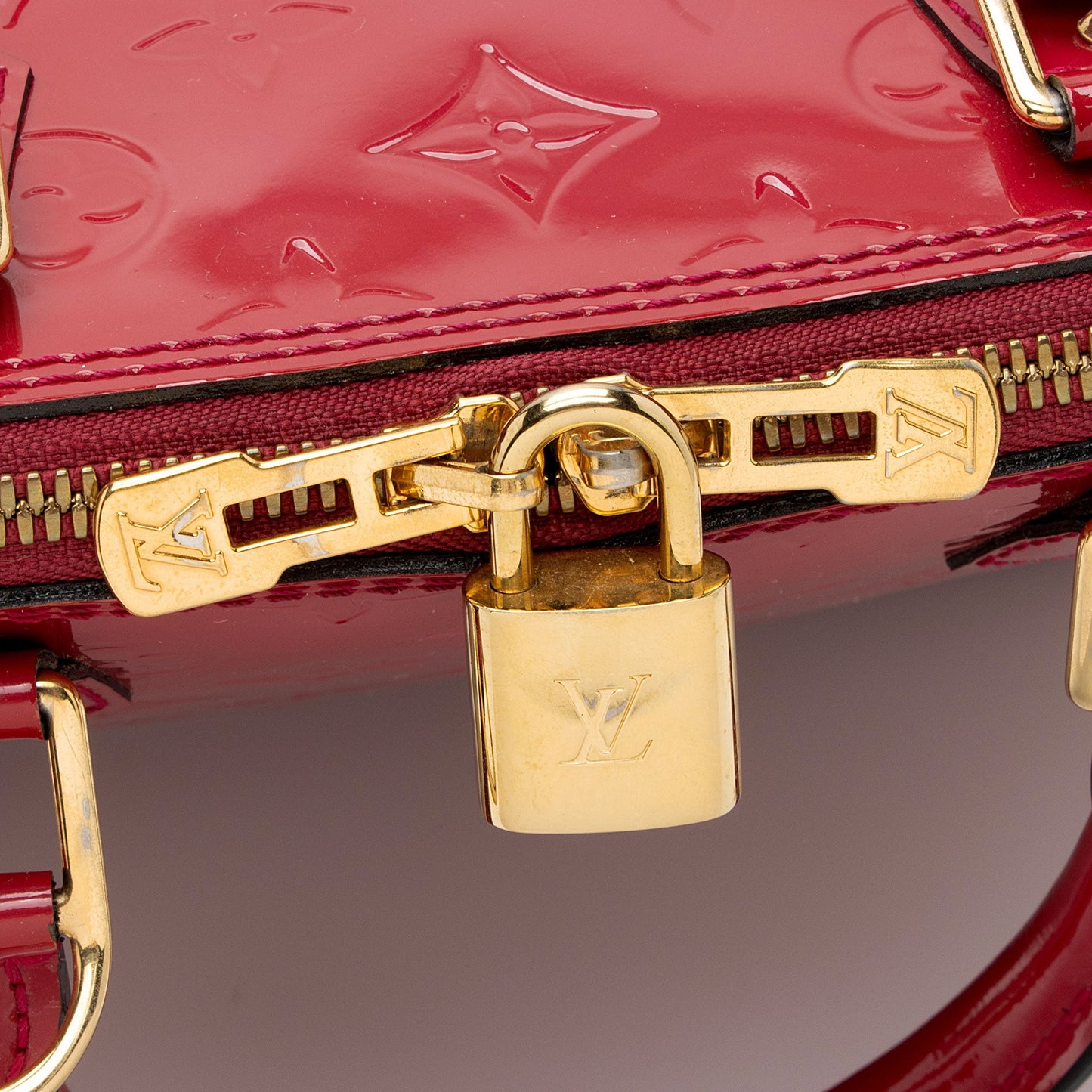 Louis Vuitton Monogram Vernis Alma PM Satchel (SHF-aJkS4O)