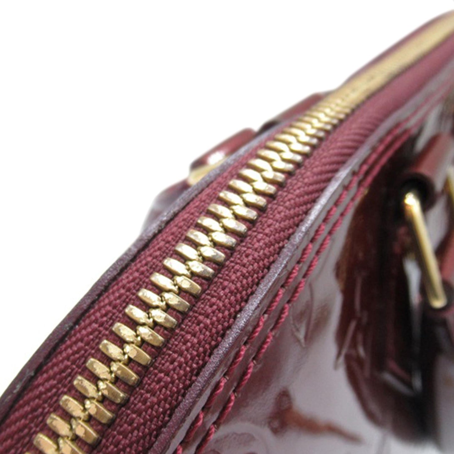Louis Vuitton Monogram Vernis Alma PM (SHG-6sE6J2)