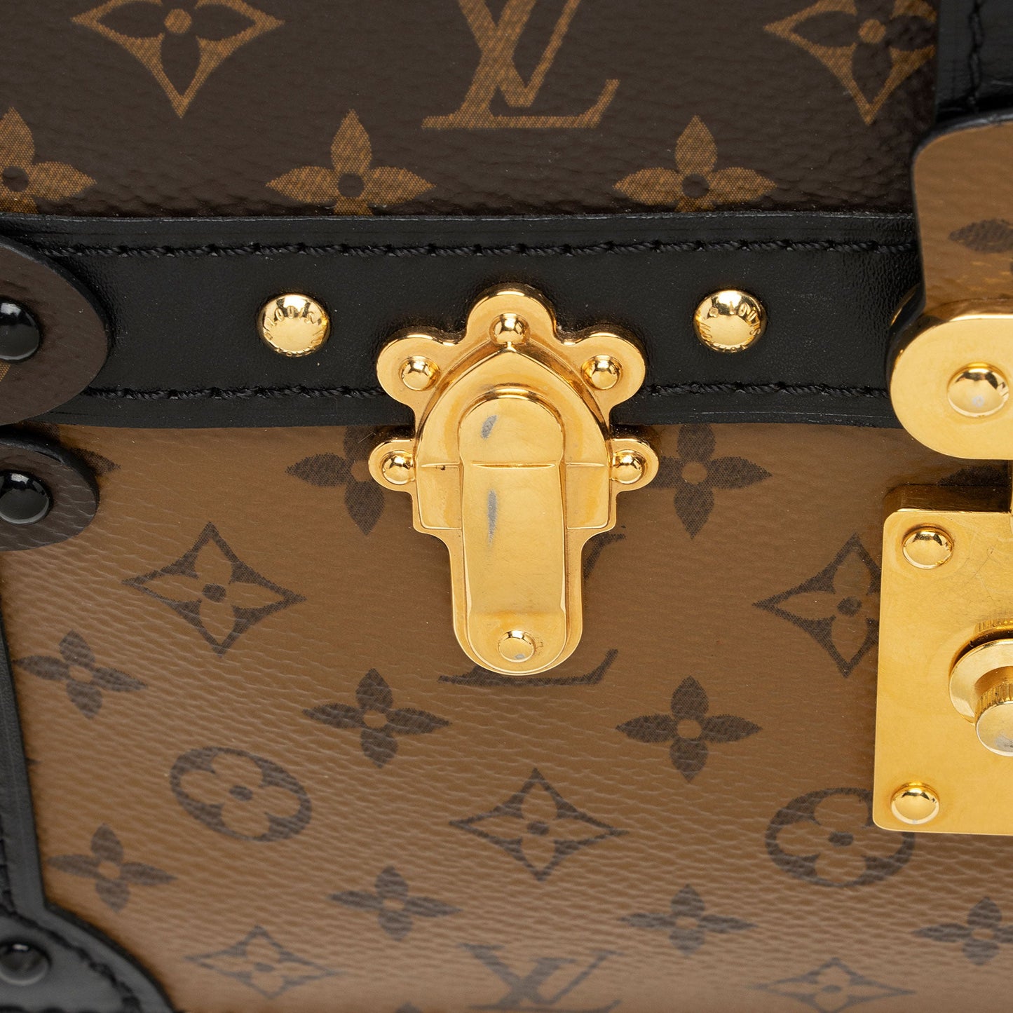 Louis Vuitton Reverse Monogram Trunk Clutch (SHF-sTBUNH)