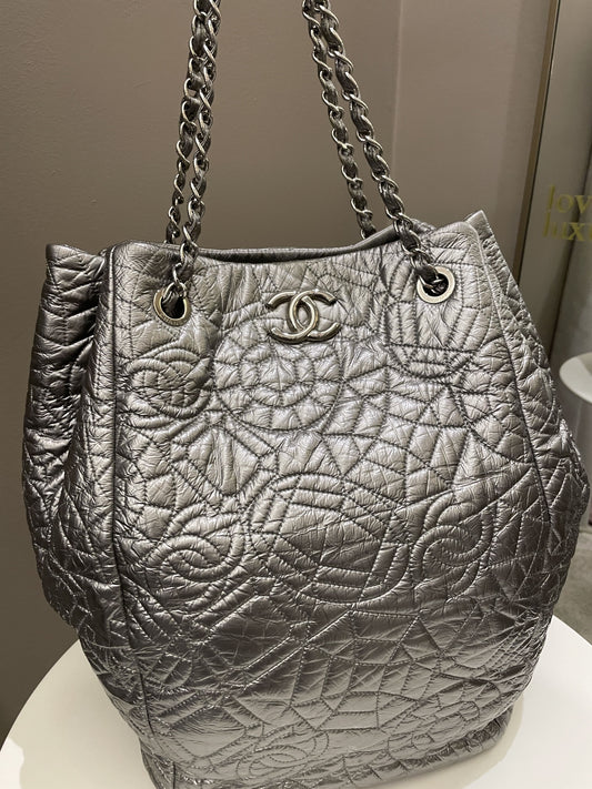 Luxury Chanel Camilla Graphic Embossed Bag Silver Patent