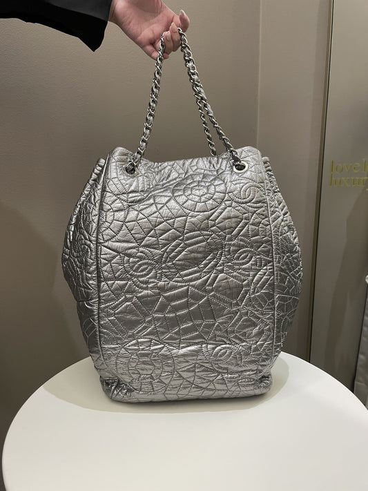 Luxury Chanel Camilla Graphic Embossed Bag Silver Patent