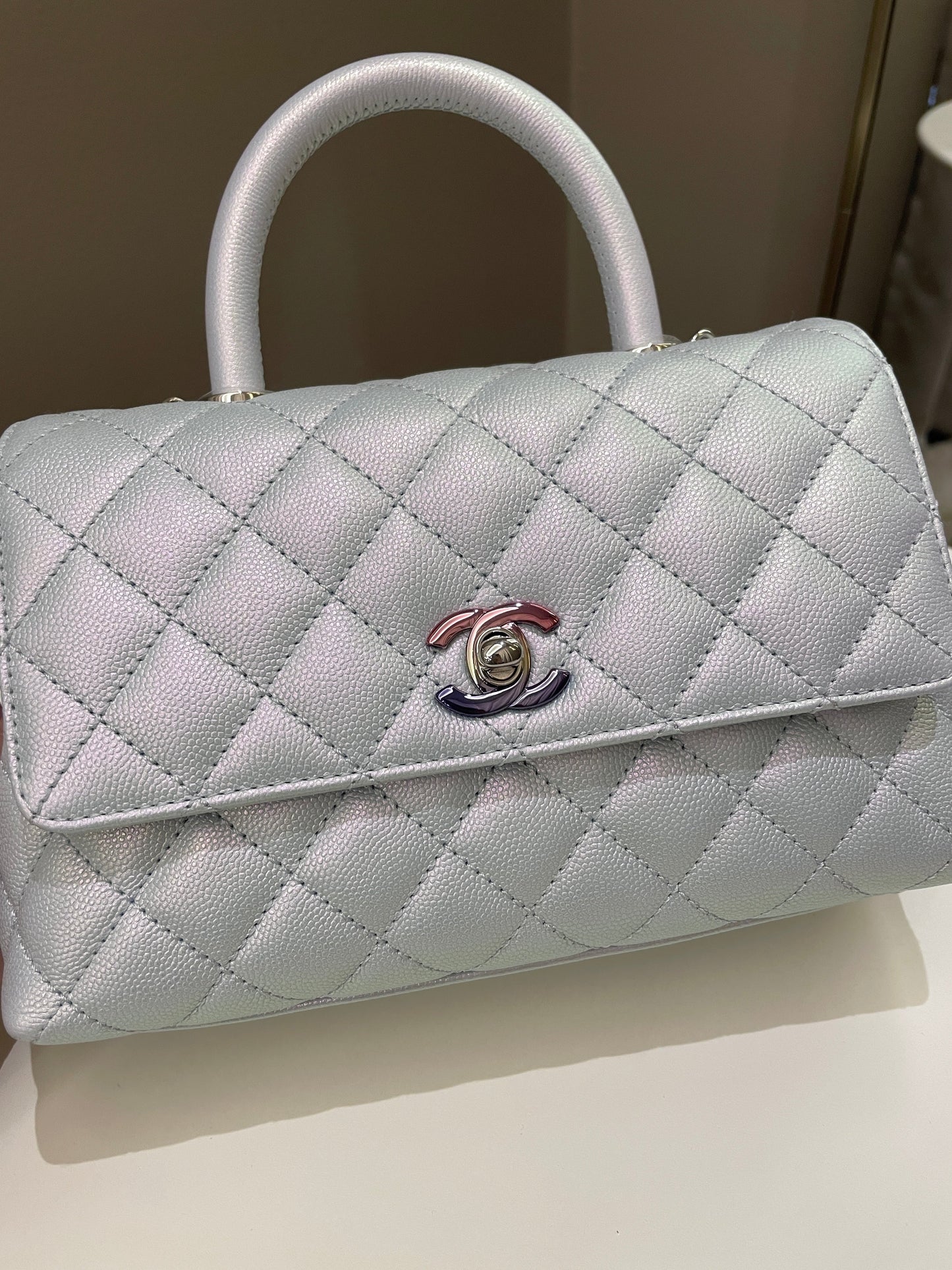Luxury Chanel 21K Quilted Coco Handle Blue Iridescent Caviar