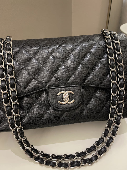 Luxury Chanel Classic Quilted Jumbo Double Flap Black Caviar