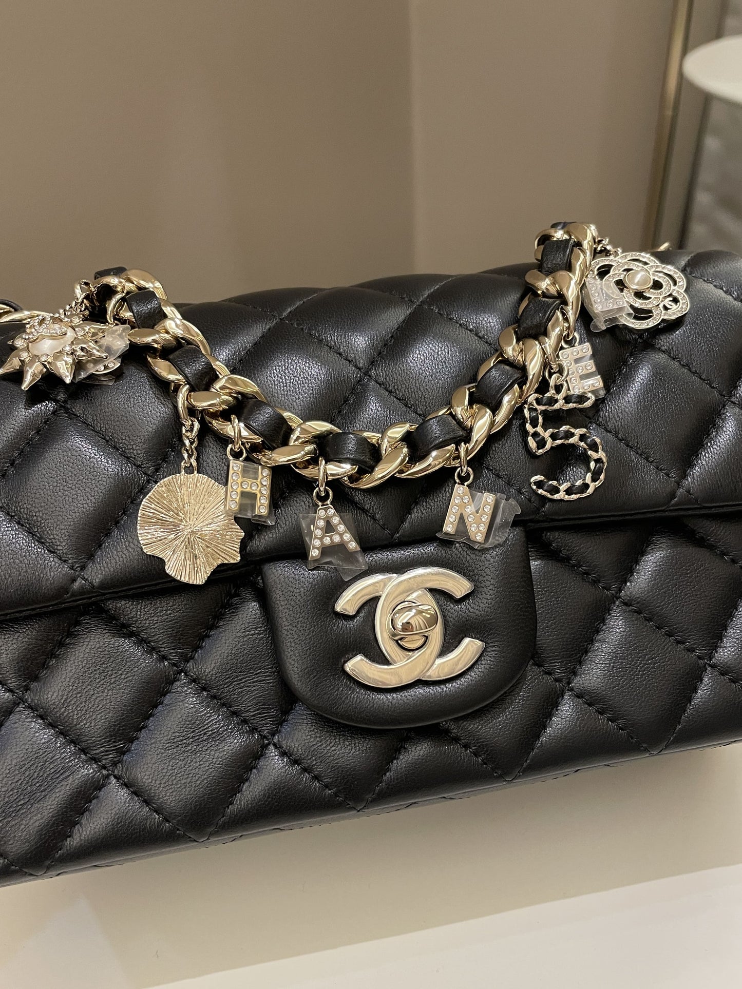 Luxury Chanel Quilted Mini Coco Charms Rectangular Flap Black Lambskin