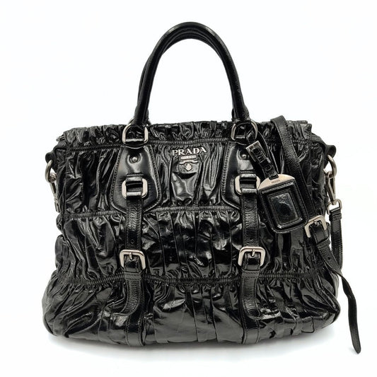 Luxury PradaShopper shoulder bag in black Gaufre paint