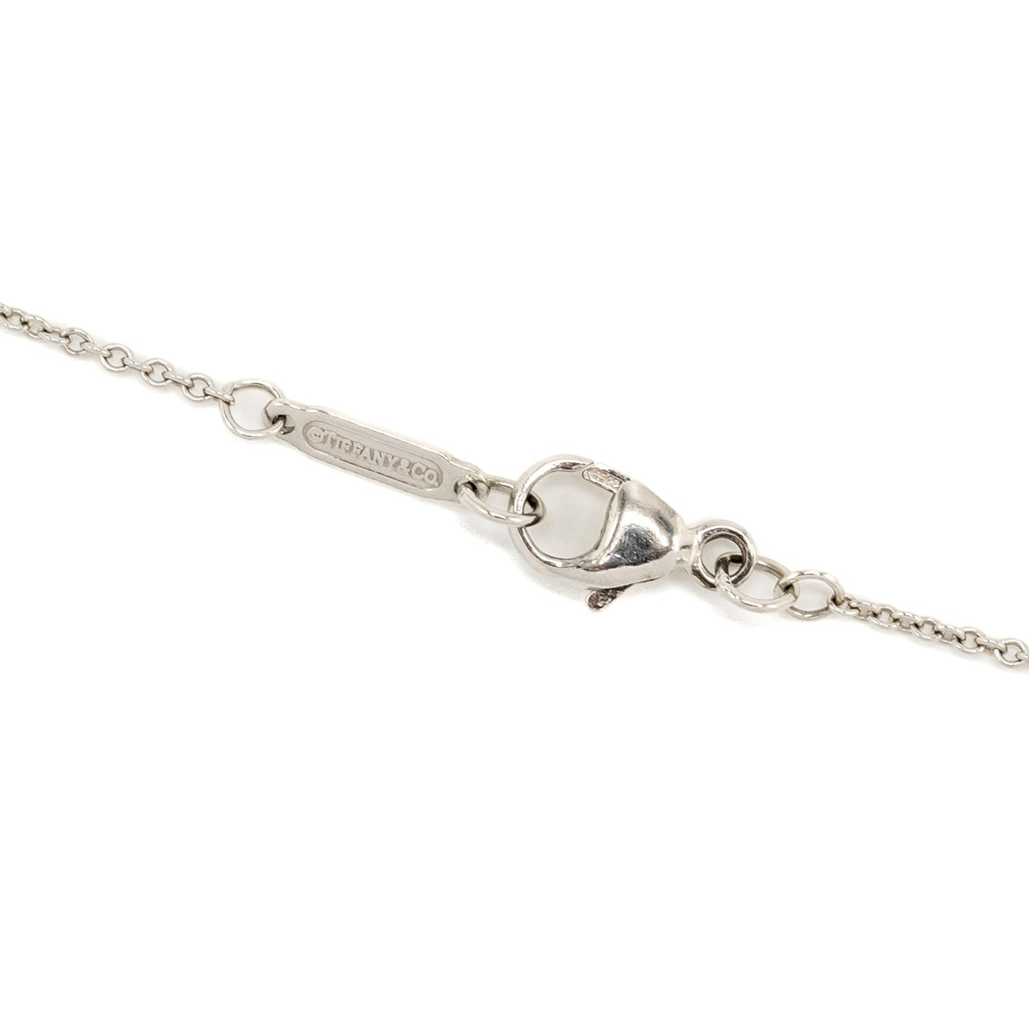 Tiffany platinum and 18 carat rose gold soleste round diamond and pink diamond pendant