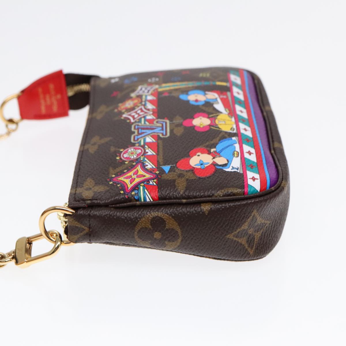 Louis Vuitton Mini Pochette Accessoires  Canvas Clutch Bag ()