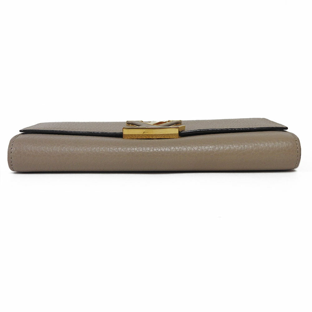 Louis Vuitton Leather Wallet Beige M61249