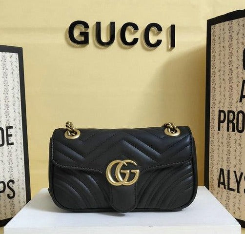 Women's Luxury Gucci GG Marmont matelassé mini bag