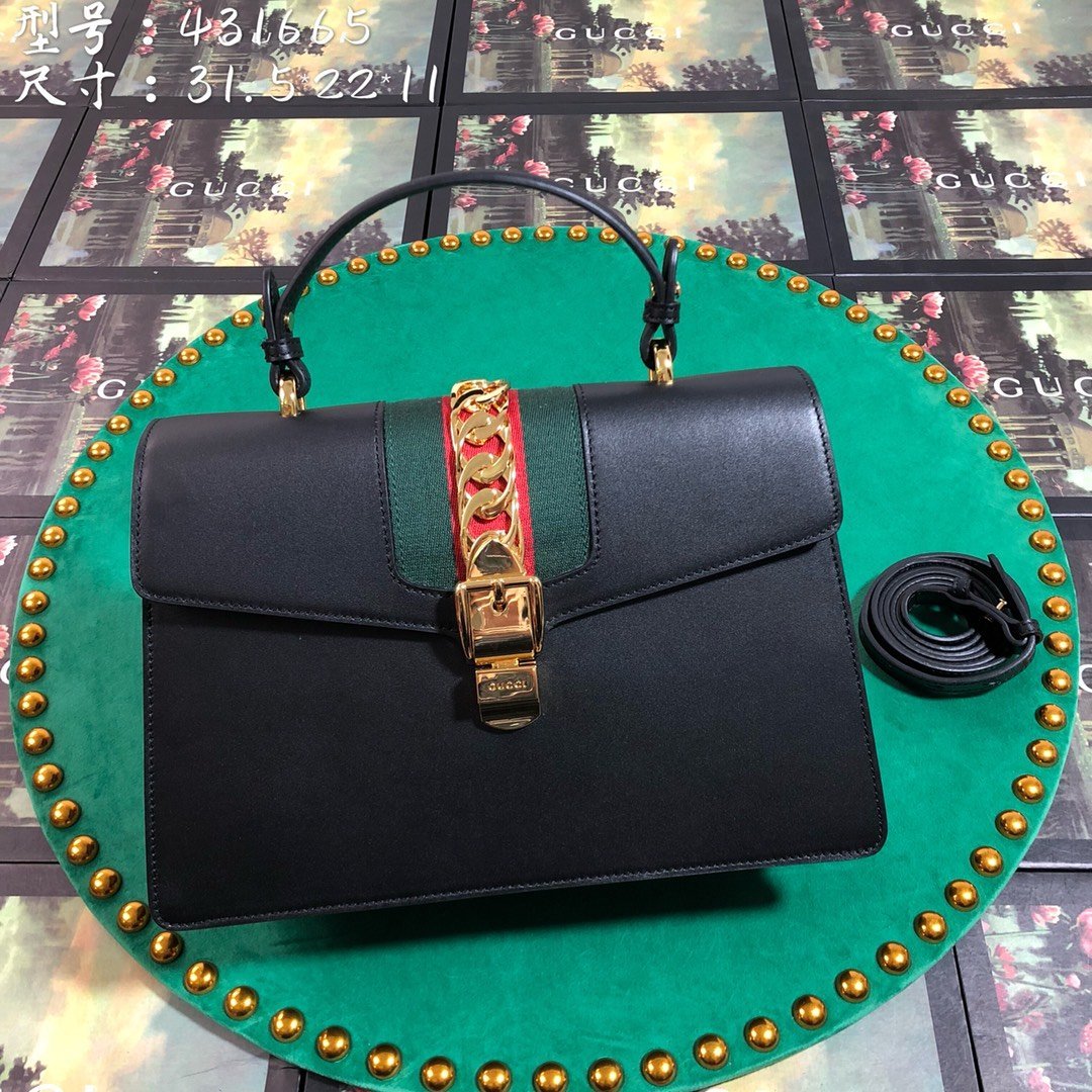 Luxury Gucci GG Sylvie Leather Medium Top Handle Bag