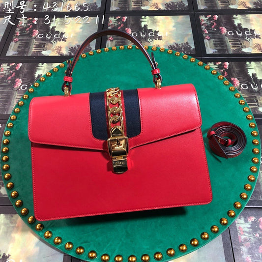 Luxury Gucci GG Sylvie Leather Medium Top Handle Bag