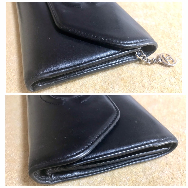 Luxury Chanel Vintage black leather wallet with large CC stitch mark