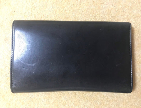 Luxury Chanel Vintage black leather wallet with large CC stitch mark