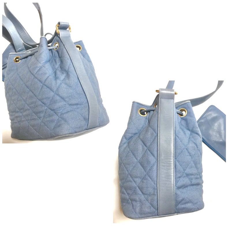 Luxury Chanel Vintage blue quilted canvas and leather combo hobo bucket shoulder bag with drawstrings and golden CC mark balls